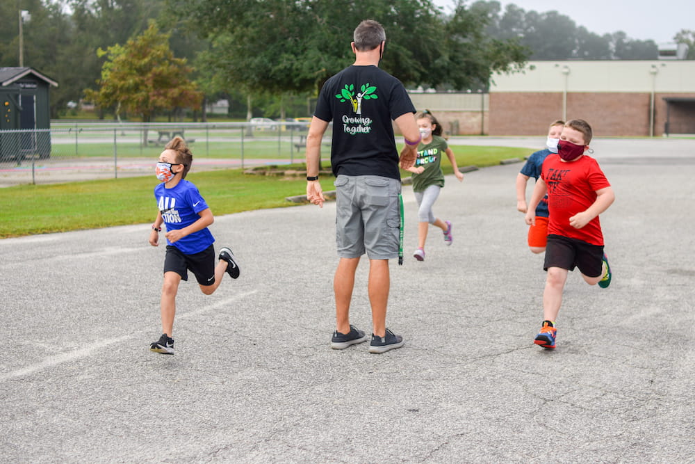 Flowertown Elementary School physical activity opportunities led by physical education teacher, “Mr. C.” Photo courtesy of the MUSC Boeing Center for Children's Wellness.